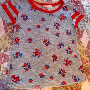 Red and blue tee with gray overall color